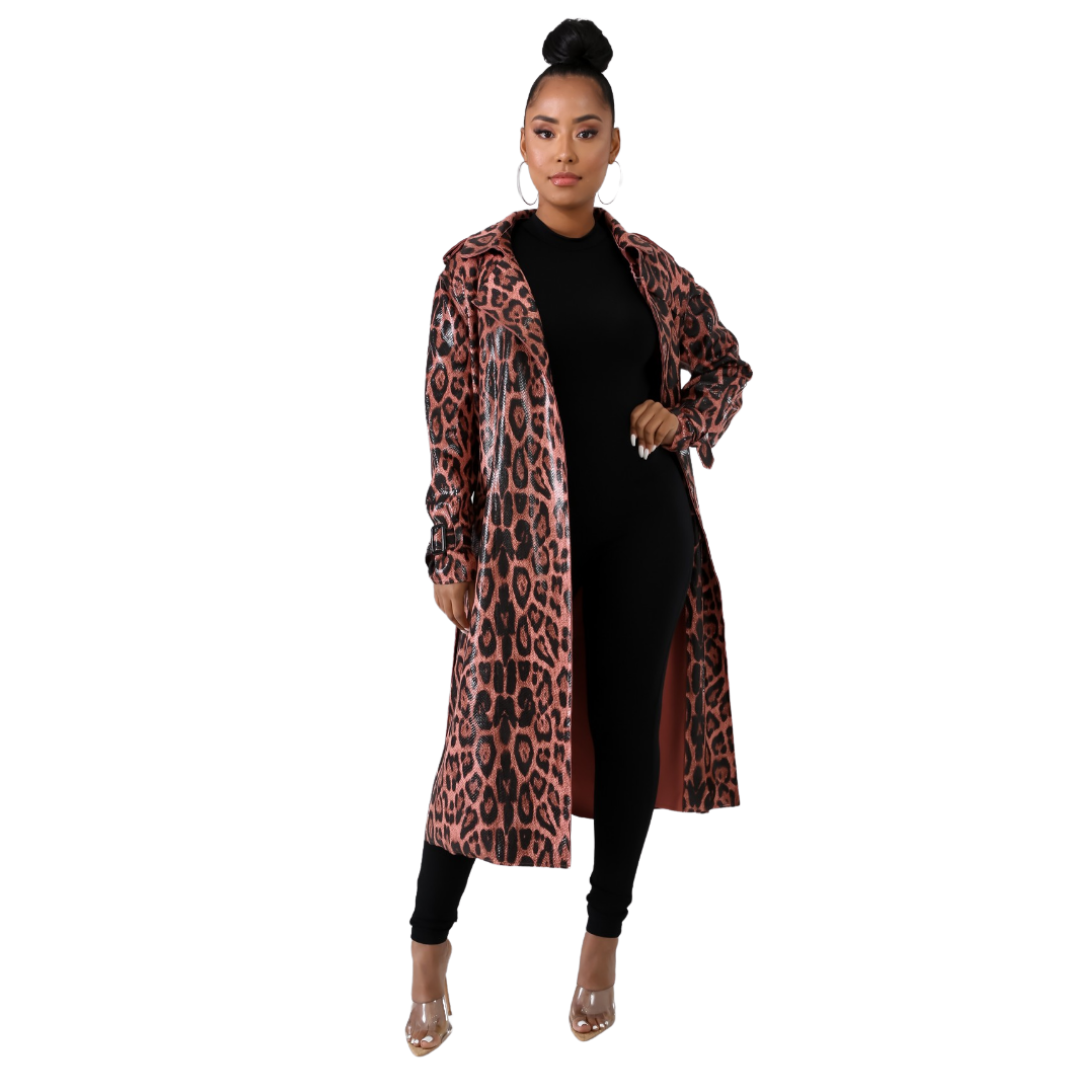 Sleek and attractive snake design trench coat. You will look stunning when you wear this to brunch, girls' night out or any casual event.  Snake design, high collar neckline, long sleeves, tie waste belt and tie wrist straps.  Great for cool nights cover up.  